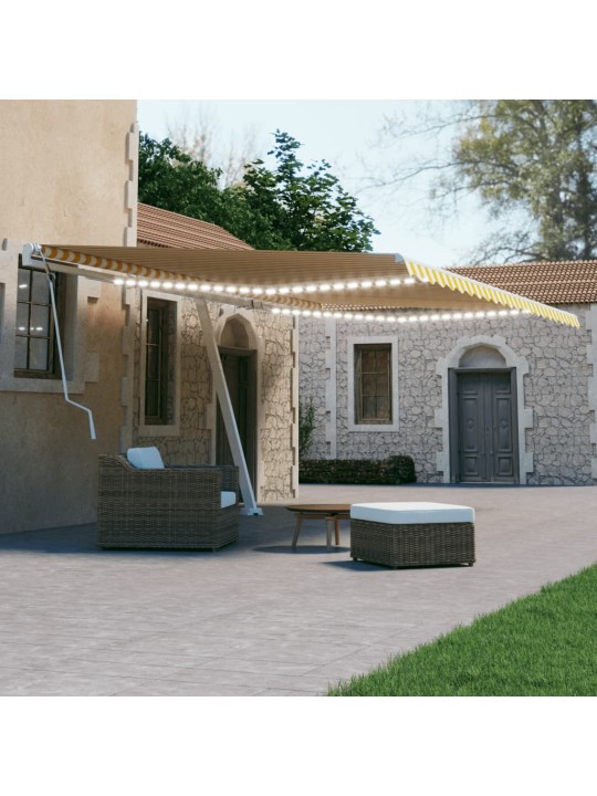 Ručně zatahovací markýza s LED světlem 600 x 300 cm žlutobílá