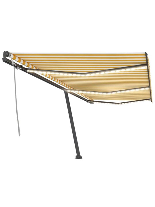 Ručně zatahovací markýza s LED světlem 600 x 300 cm žlutobílá