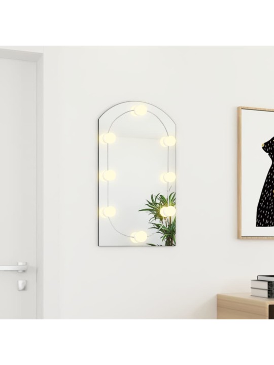 Zrcadlo s LED světly 70 x 40 cm sklo obloukové