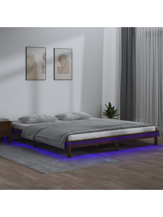 Rám postele s LED světlem medově hnědý 140x200 cm masivní dřevo