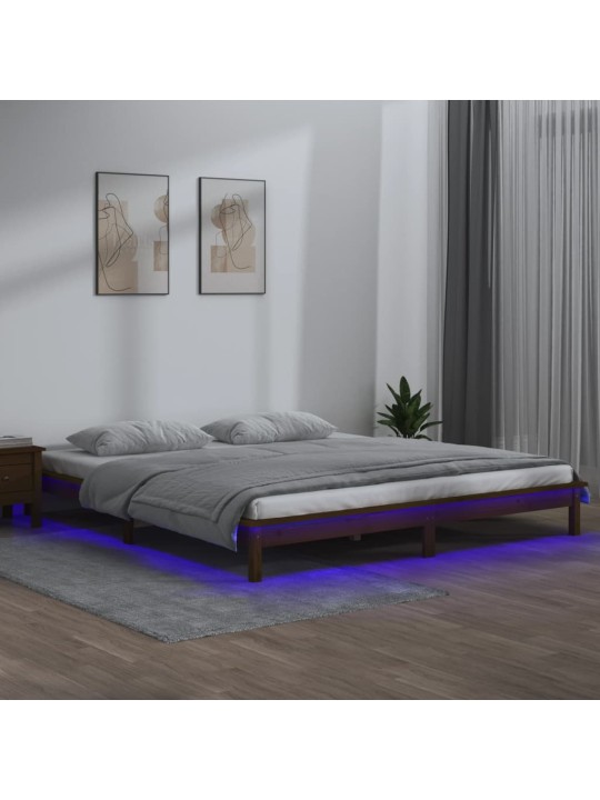 Rám postele s LED světlem medově hnědý 140x190 cm masivní dřevo