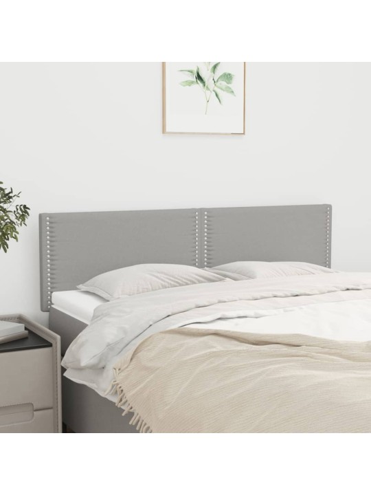 Čela postele 2 ks světle šedá 72 x 5 x 78/88 cm textil