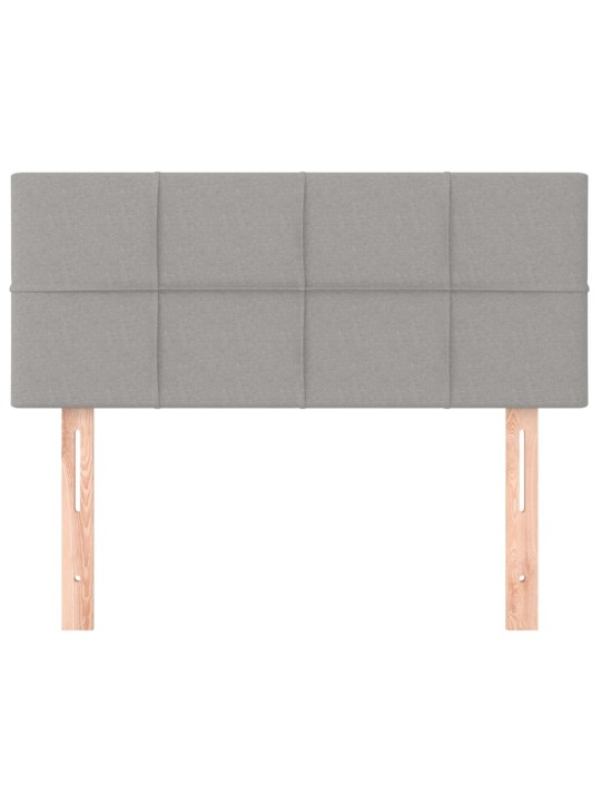 Čelo postele světle šedé 90x5x78/88 cm textil