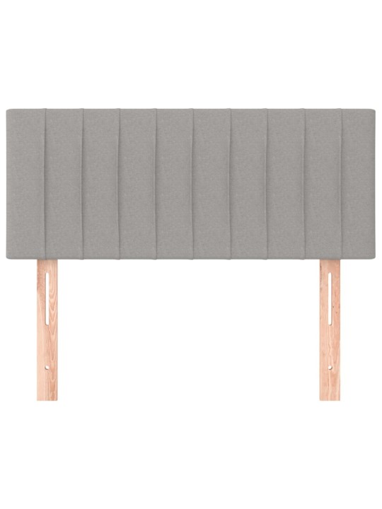 Čelo postele světle šedé 90x5x78/88 cm textil