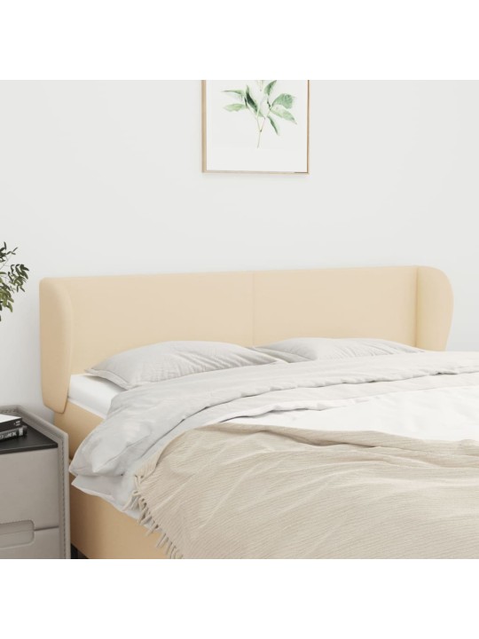 Čelo postele typu ušák krémové 147x23x78/88 cm textil