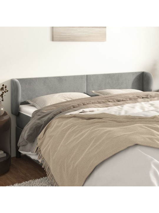 Čelo postele typu ušák světle šedé 203x23x78/88 cm samet