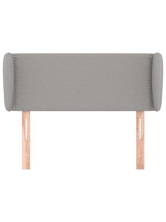 Čelo postele typu ušák světle šedé 83x23x78/88 cm textil