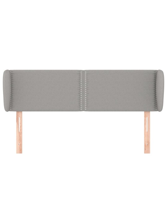 Čelo postele typu ušák světle šedé 147x23x78/88 cm textil