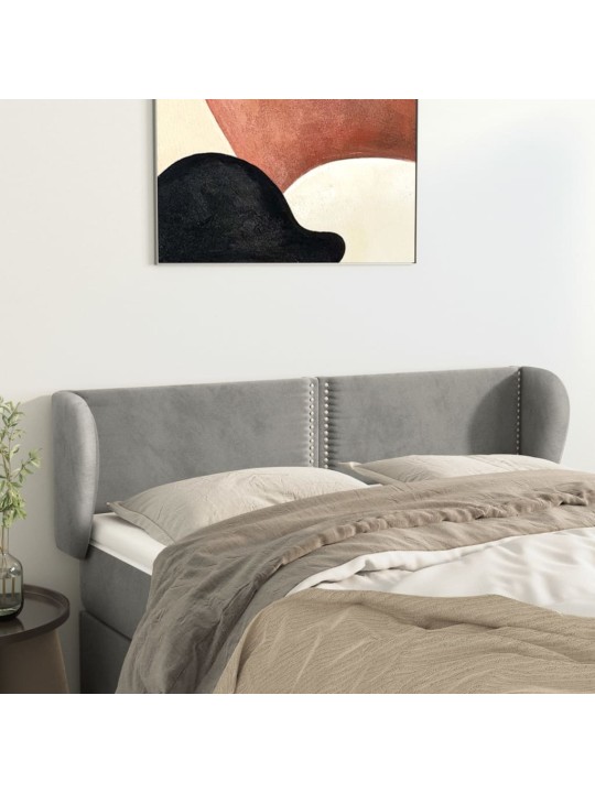 Čelo postele typu ušák světle šedé 147x23x78/88 cm samet