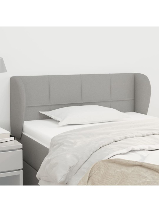 Čelo postele typu ušák světle šedé 93x23x78/88 cm textil