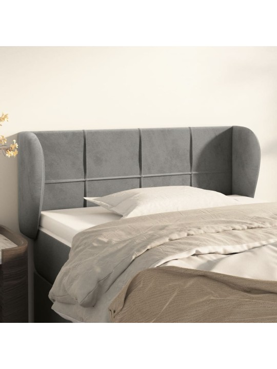 Čelo postele typu ušák světle šedé 103x23x78/88 cm samet