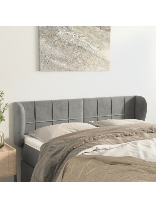 Čelo postele typu ušák světle šedé 147x23x78/88 cm samet