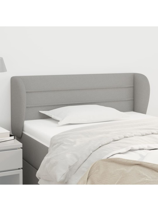 Čelo postele typu ušák světle šedé 93x23x78/88 cm textil