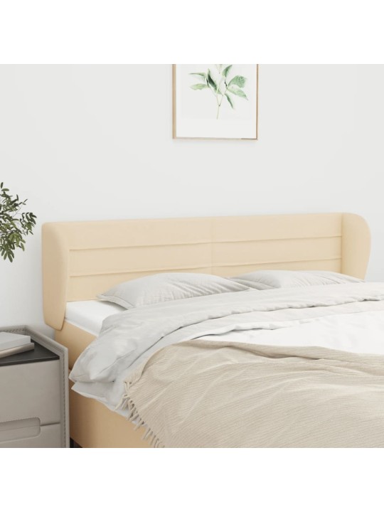 Čelo postele typu ušák krémové 147x23x78/88 cm textil