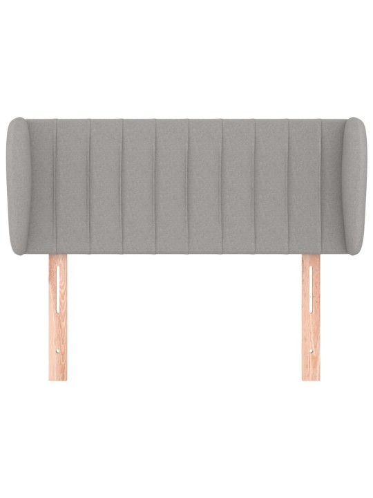 Čelo postele typu ušák světle šedé 83x23x78/88 cm textil