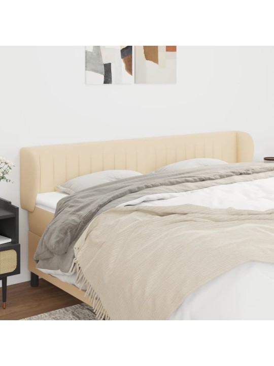 Čelo postele typu ušák krémové 163x23x78/88 cm textil