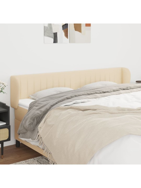 Čelo postele typu ušák krémové 183x23x78/88 cm textil