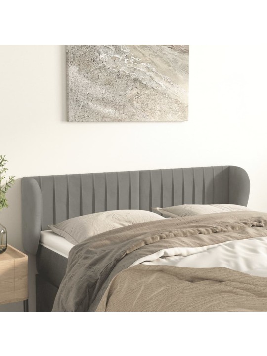 Čelo postele typu ušák světle šedé 147x23x78/88 cm samet