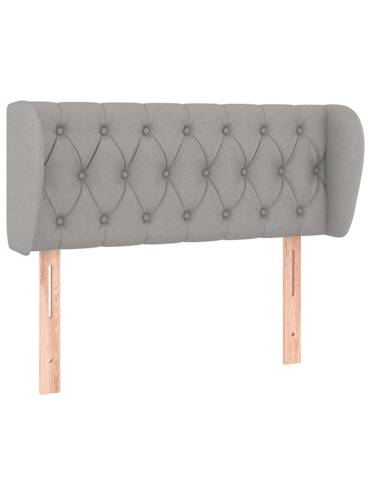 Čelo postele typu ušák světle šedé 103x23x78/88 cm textil