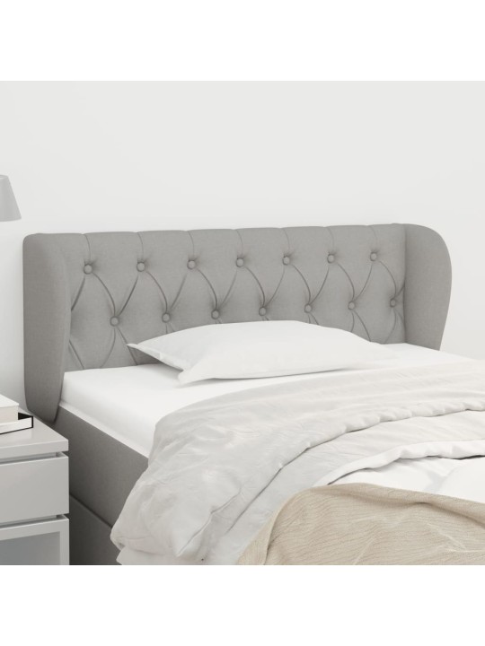 Čelo postele typu ušák světle šedé 103x23x78/88 cm textil