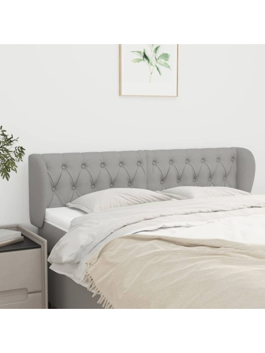 Čelo postele typu ušák světle šedé 163x23x78/88 cm textil