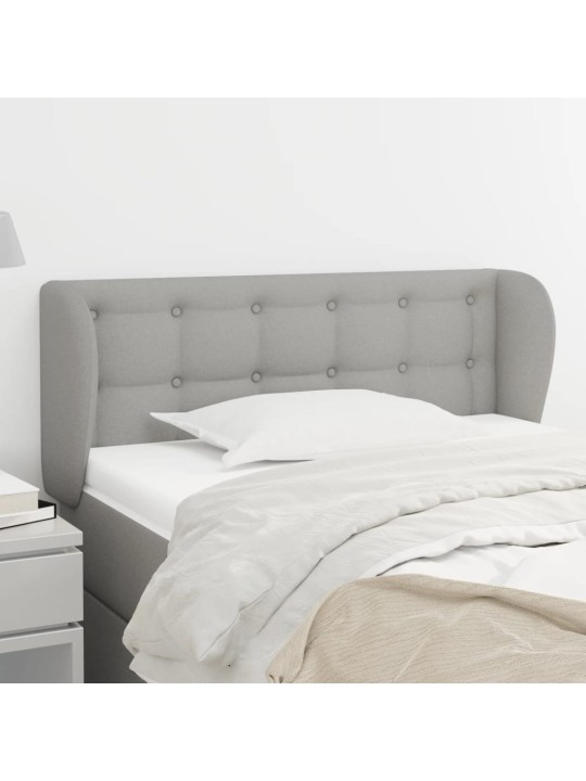 Čelo postele typu ušák světle šedé 103x23x78/88 cm textil
