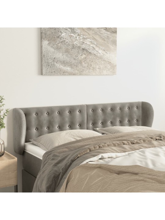 Čelo postele typu ušák světle šedé 147x23x78/88 cm samet