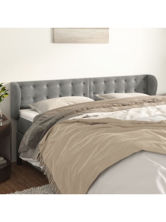 Čelo postele typu ušák světle šedé 183x23x78/88 cm samet