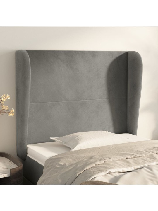 Čelo postele typu ušák světle šedé 103x23x118/128 cm samet