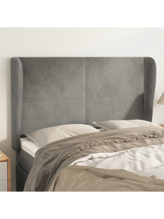 Čelo postele typu ušák světle šedé 147x23x118/128 cm samet