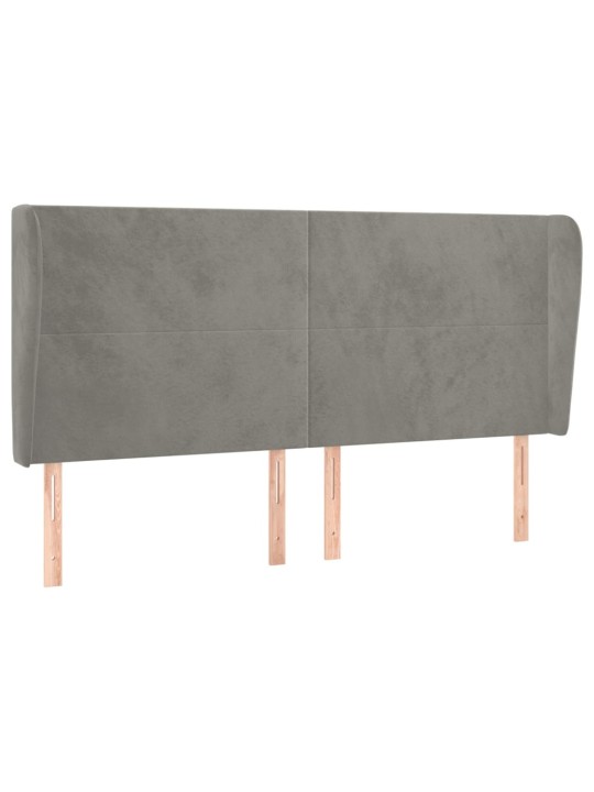 Čelo postele typu ušák světle šedé 163x23x118/128 cm samet