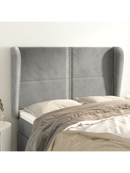 Čelo postele typu ušák světle šedé 147x23x118/128 cm samet