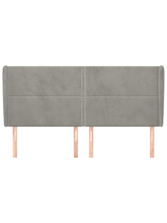 Čelo postele typu ušák světle šedé 183x23x118/128 cm samet