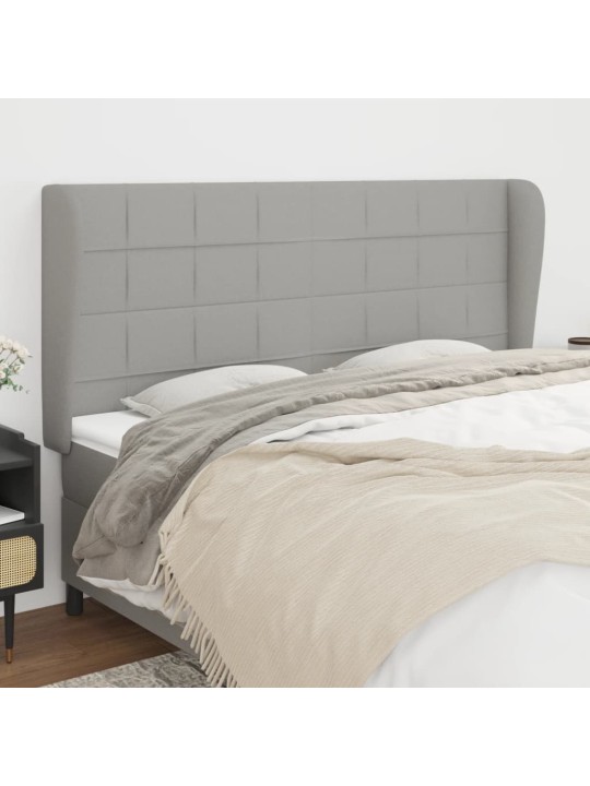 Čelo postele typu ušák světle šedé 203x23x118/128 cm textil