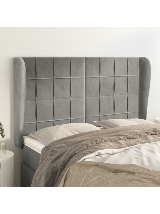 Čelo postele typu ušák světle šedé 147x23x118/128 cm samet