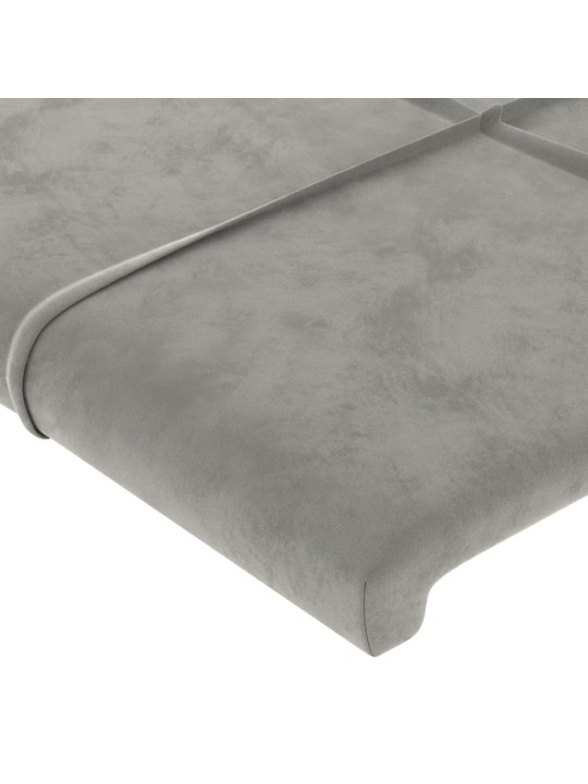 Čelo postele typu ušák světle šedé 183x23x118/128 cm samet
