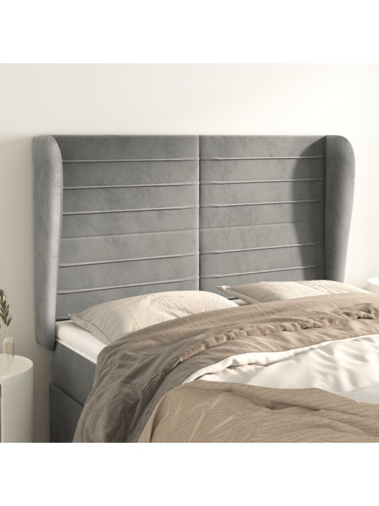 Čelo postele typu ušák světle šedé 147x23x118/128 cm samet