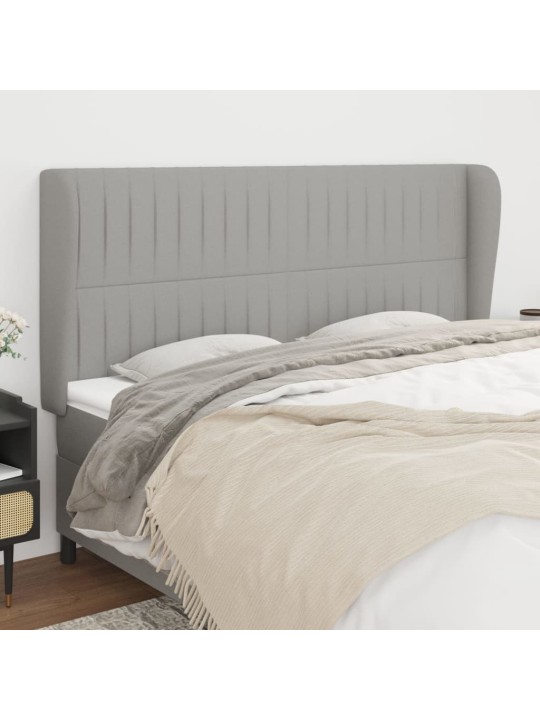 Čelo postele typu ušák světle šedé 203x23x118/128 cm textil