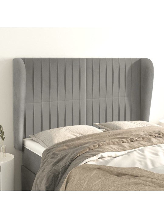 Čelo postele typu ušák světle šedé 147x23x118/128 cm samet