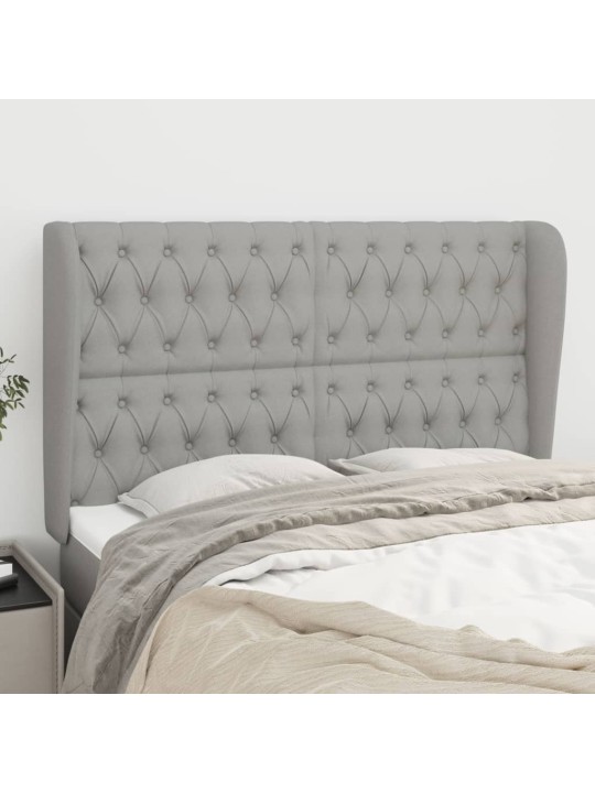 Čelo postele typu ušák světle šedé 163x23x118/128 cm textil