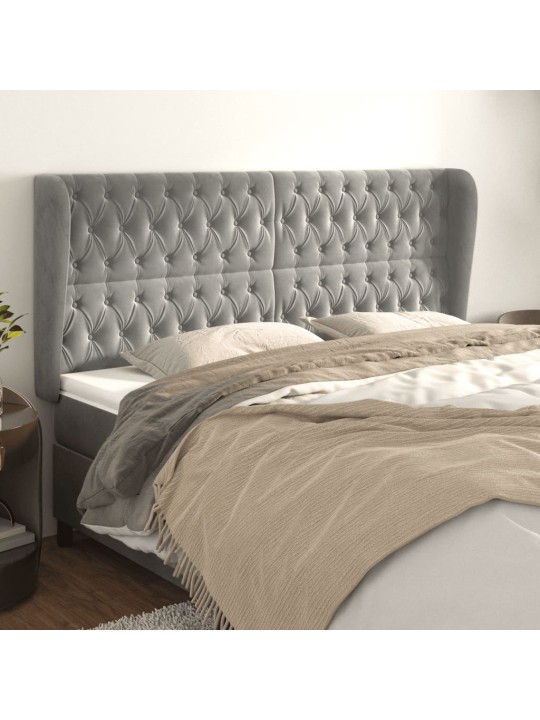 Čelo postele typu ušák světle šedé 183x23x118/128 cm samet