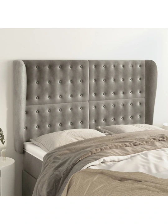 Čelo postele typu ušák světle šedé 147x23x118/128 cm samet