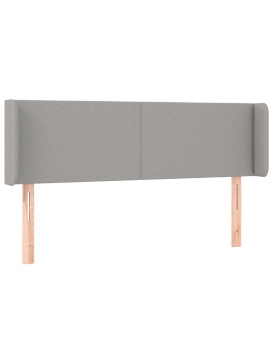 Čelo postele typu ušák světle šedé 147x16x78/88 cm textil