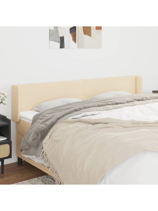 Čelo postele typu ušák krémové 163 x 16 x 78/88 cm textil
