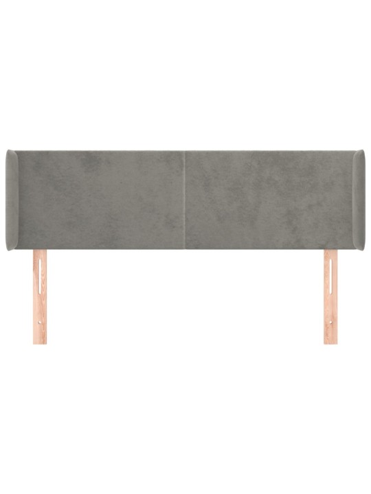 Čelo postele typu ušák světle šedé 147x16x78/88 cm samet