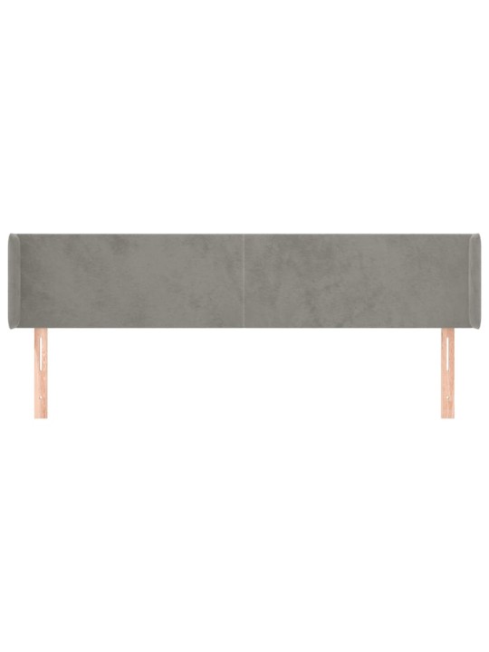 Čelo postele typu ušák světle šedé 163x16x78/88 cm samet