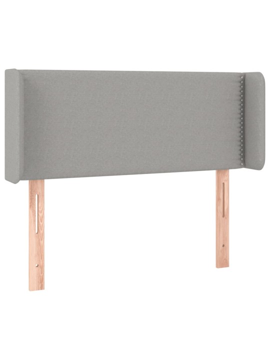 Čelo postele typu ušák světle šedé 93x16x78/88 cm textil