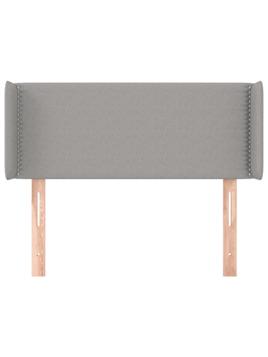 Čelo postele typu ušák světle šedé 93x16x78/88 cm textil