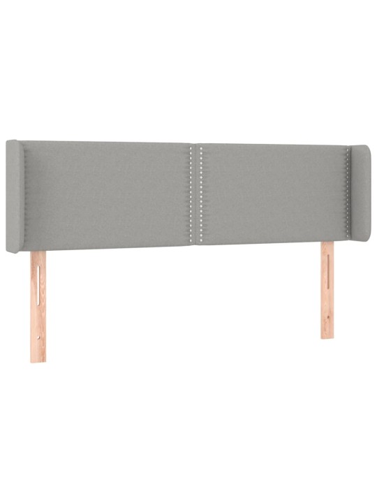 Čelo postele typu ušák světle šedé 147x16x78/88 cm textil