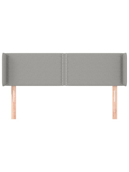 Čelo postele typu ušák světle šedé 147x16x78/88 cm textil